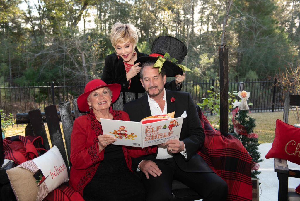 Family reading a Christmas story with playful expressions and props